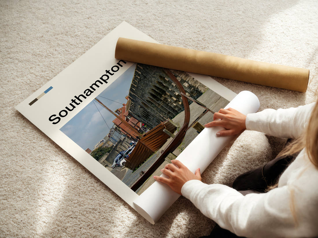 Southampton Medieval Wall And Boat Travel Print being unrolled from its postal tube