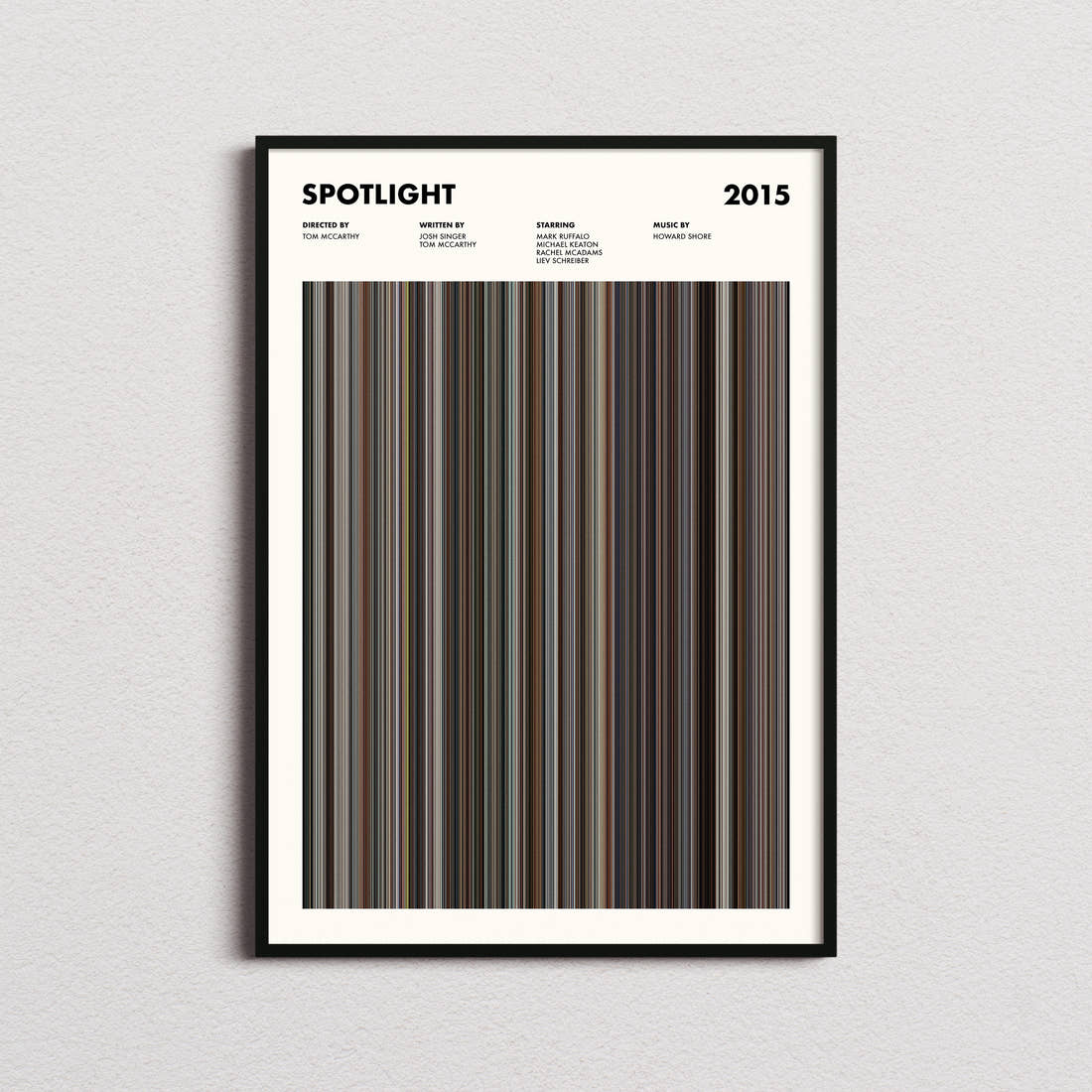 Spotlight Movie Barcode Poster framed on a plain studio wall