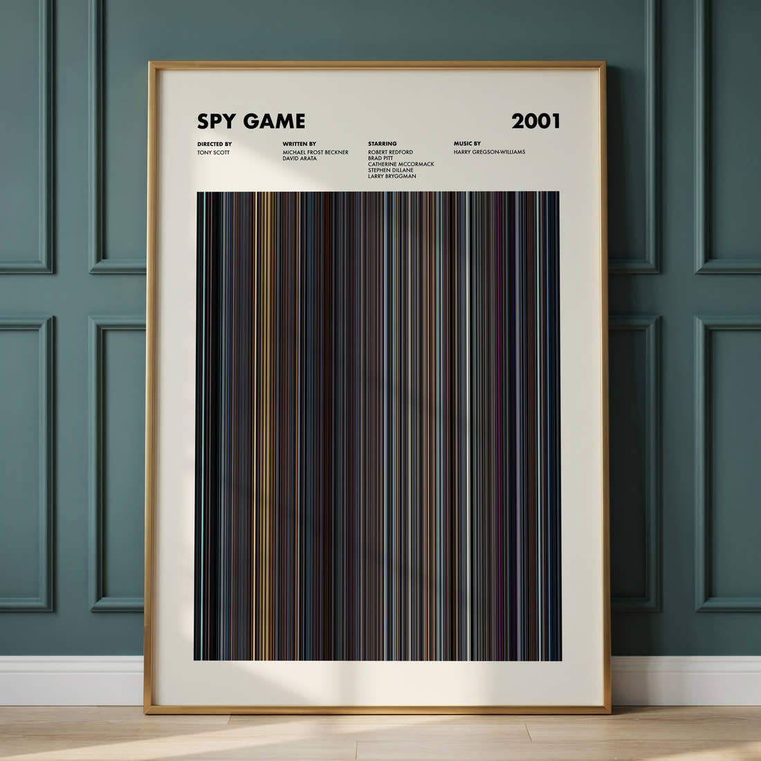 Spy Game Movie Barcode Poster framed and leaning against a panelled wall