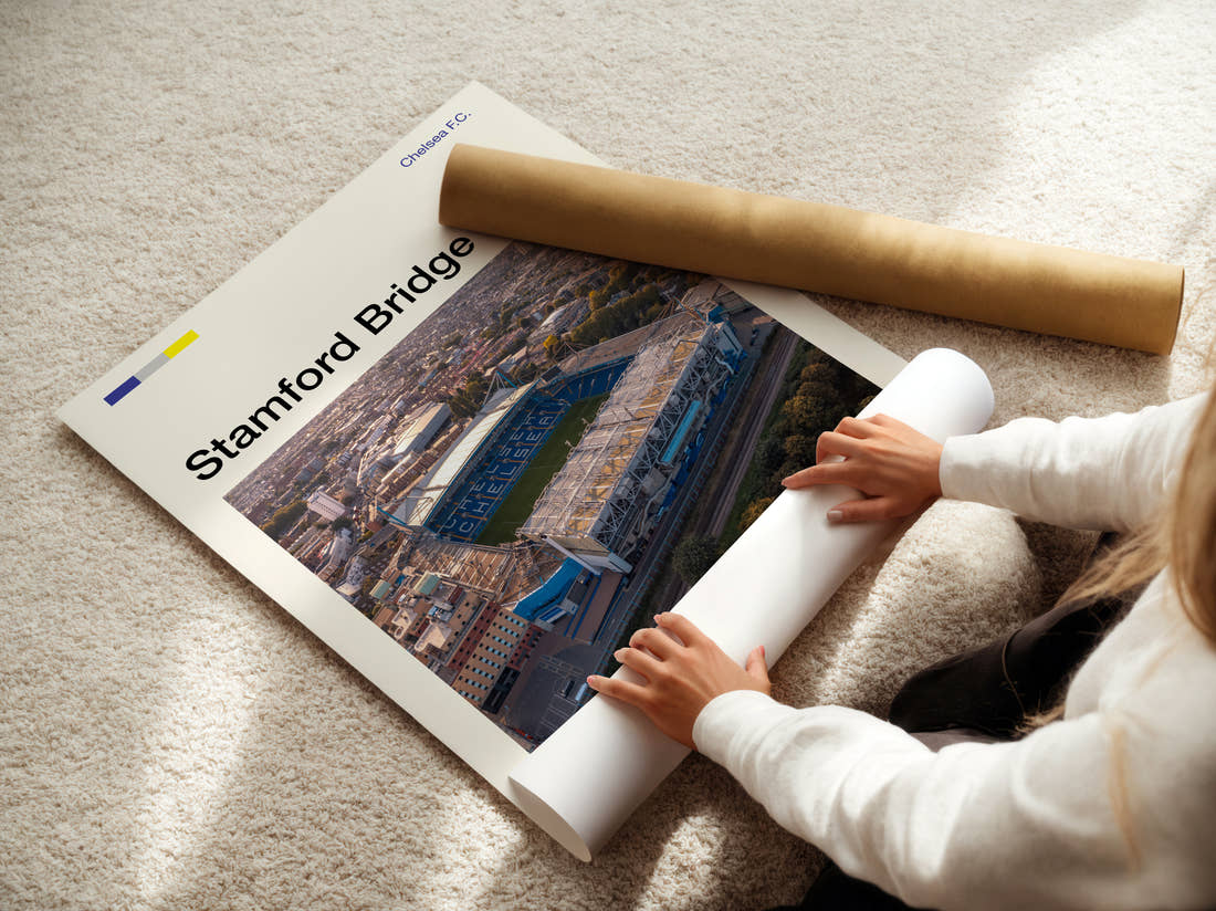 Stamford Bridge Stadium Print being unrolled from its postal tube