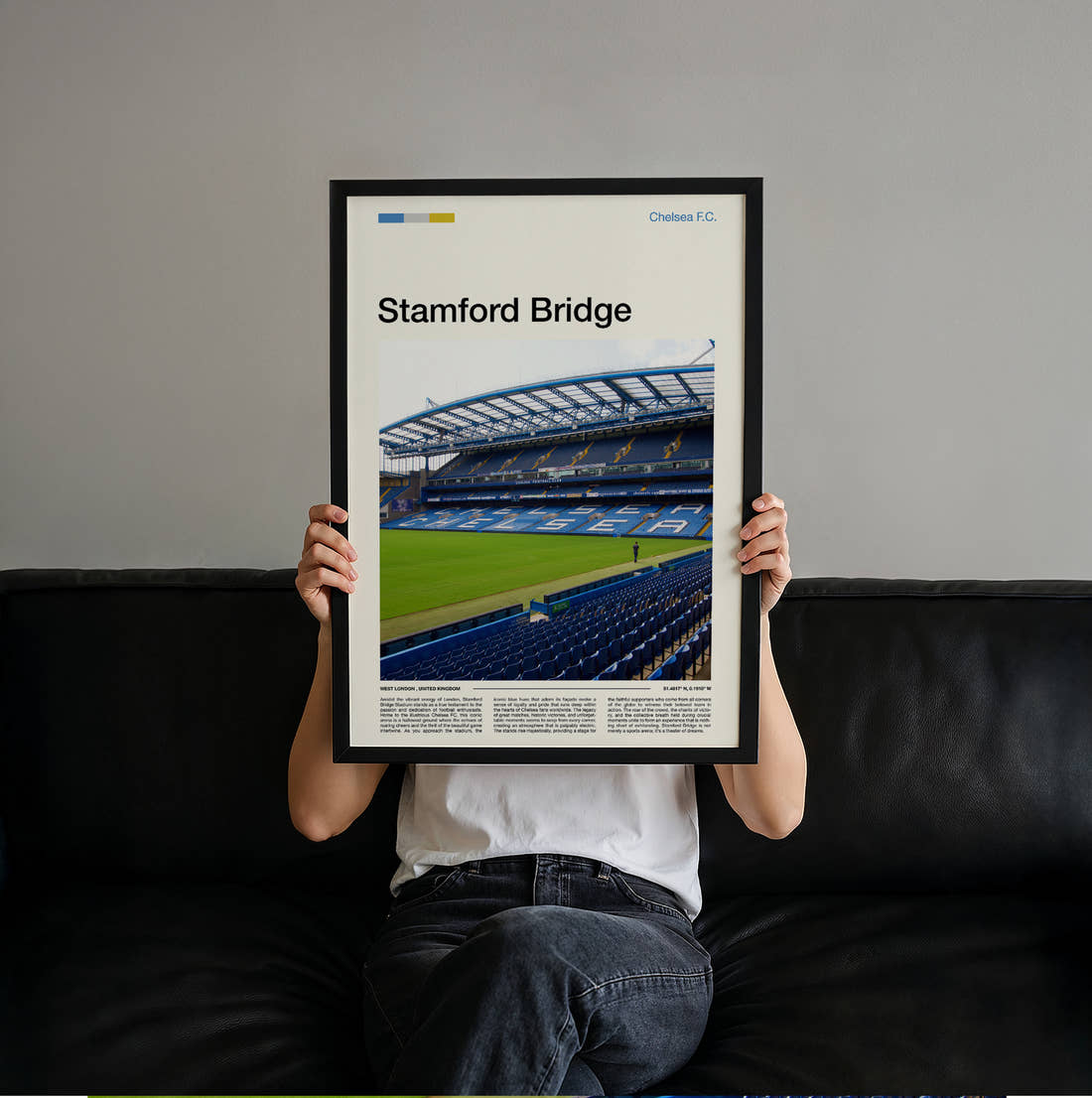 Stamford Bridge Stadium Print held up by hand to show the size of the print