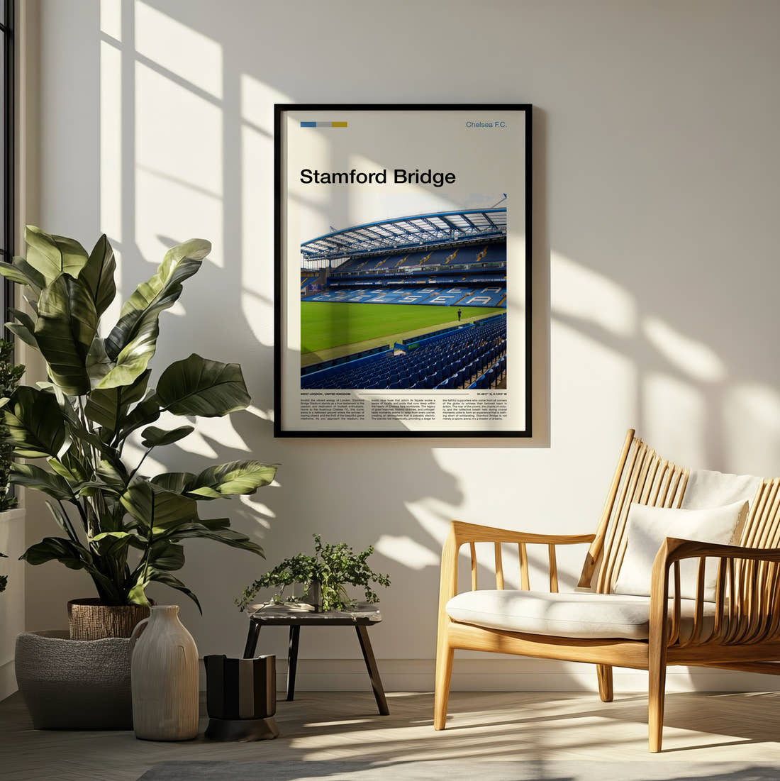 Stamford Bridge Stadium Print framed on a pale wall beside houseplants
