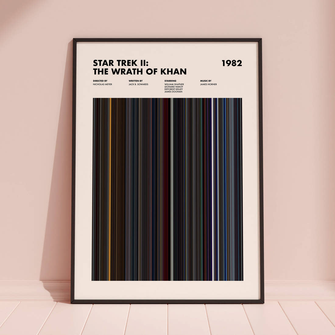 Star Trek 2 The Wrath Of Khan Movie Barcode Poster framed and leaning against a coloured wall
