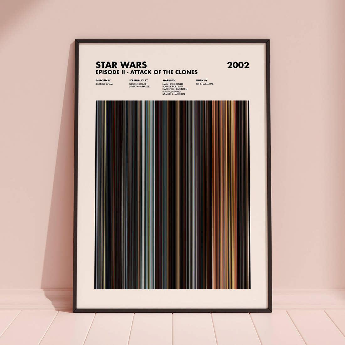 Star Wars: Episode II Attack of the Clones Movie Barcode Poster framed and leaning against a coloured wall