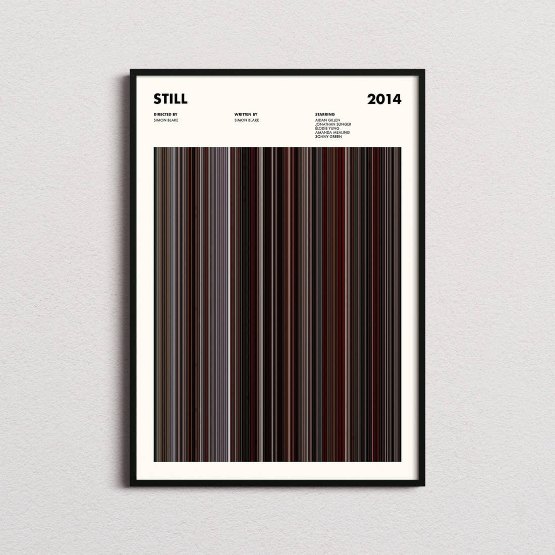 Still Movie Barcode Poster framed on a plain studio wall