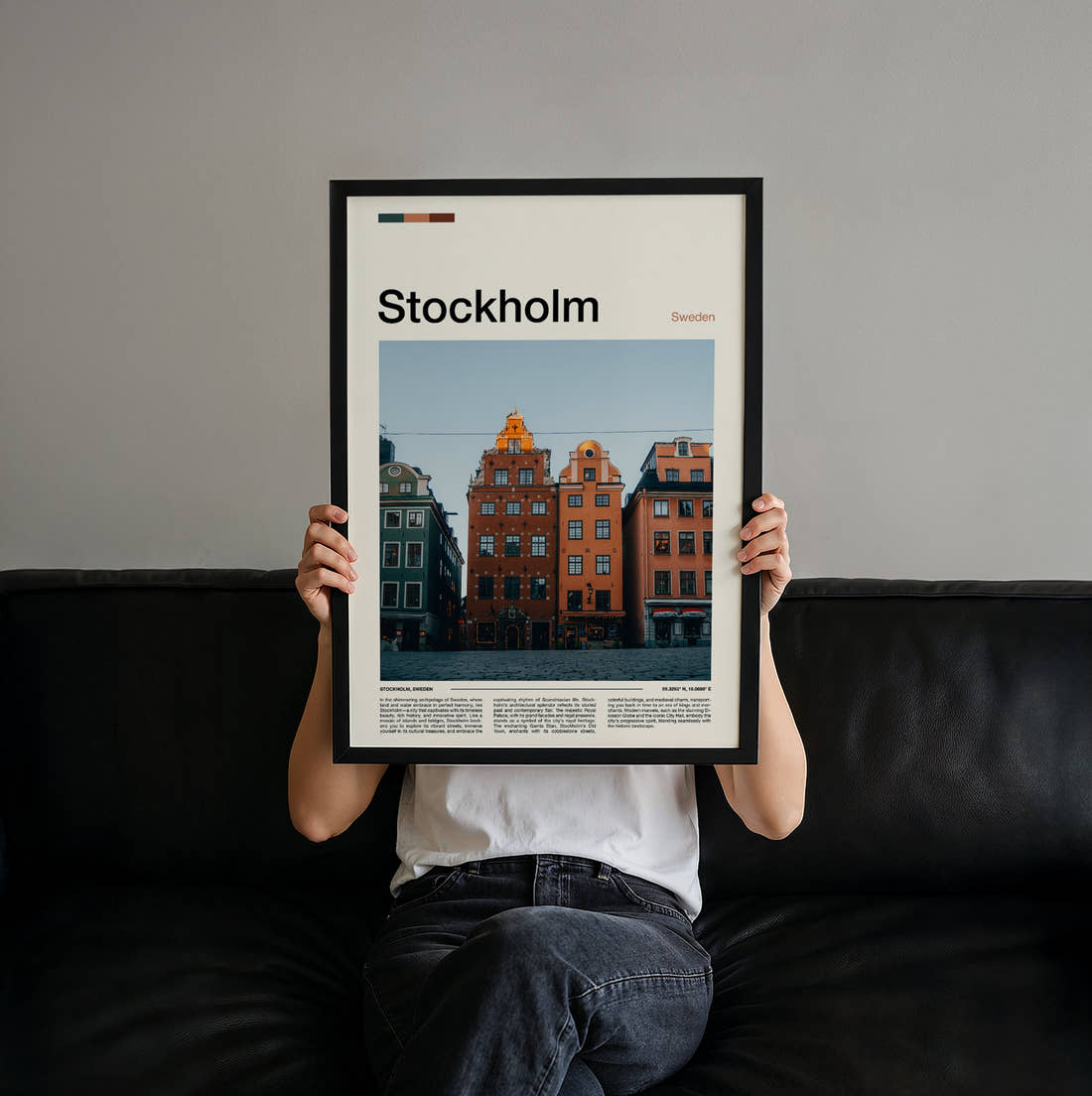 Stockholm Colourful Old Town Houses Travel Print held up by hand to show the size of the print