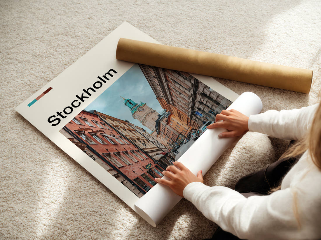 Stockholm Street And Clock Tower Travel Print being unrolled from its postal tube