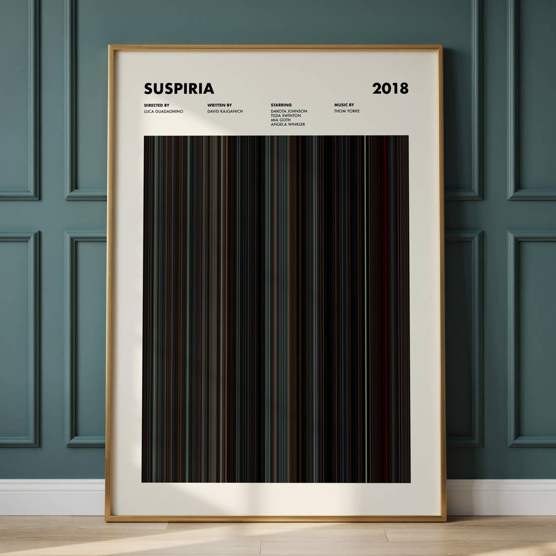 Suspiria Movie Barcode Poster framed and leaning against a panelled wall