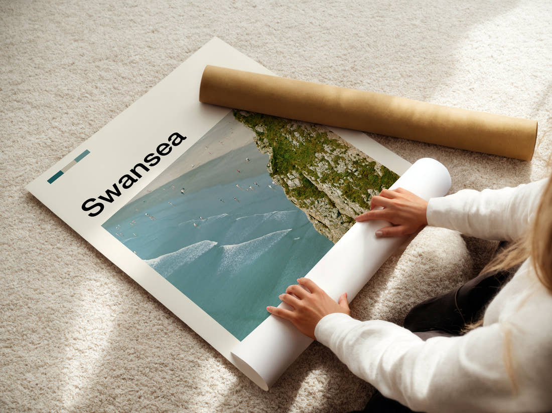 Swansea Cliff Above The Beach Travel Print being unrolled from its postal tube