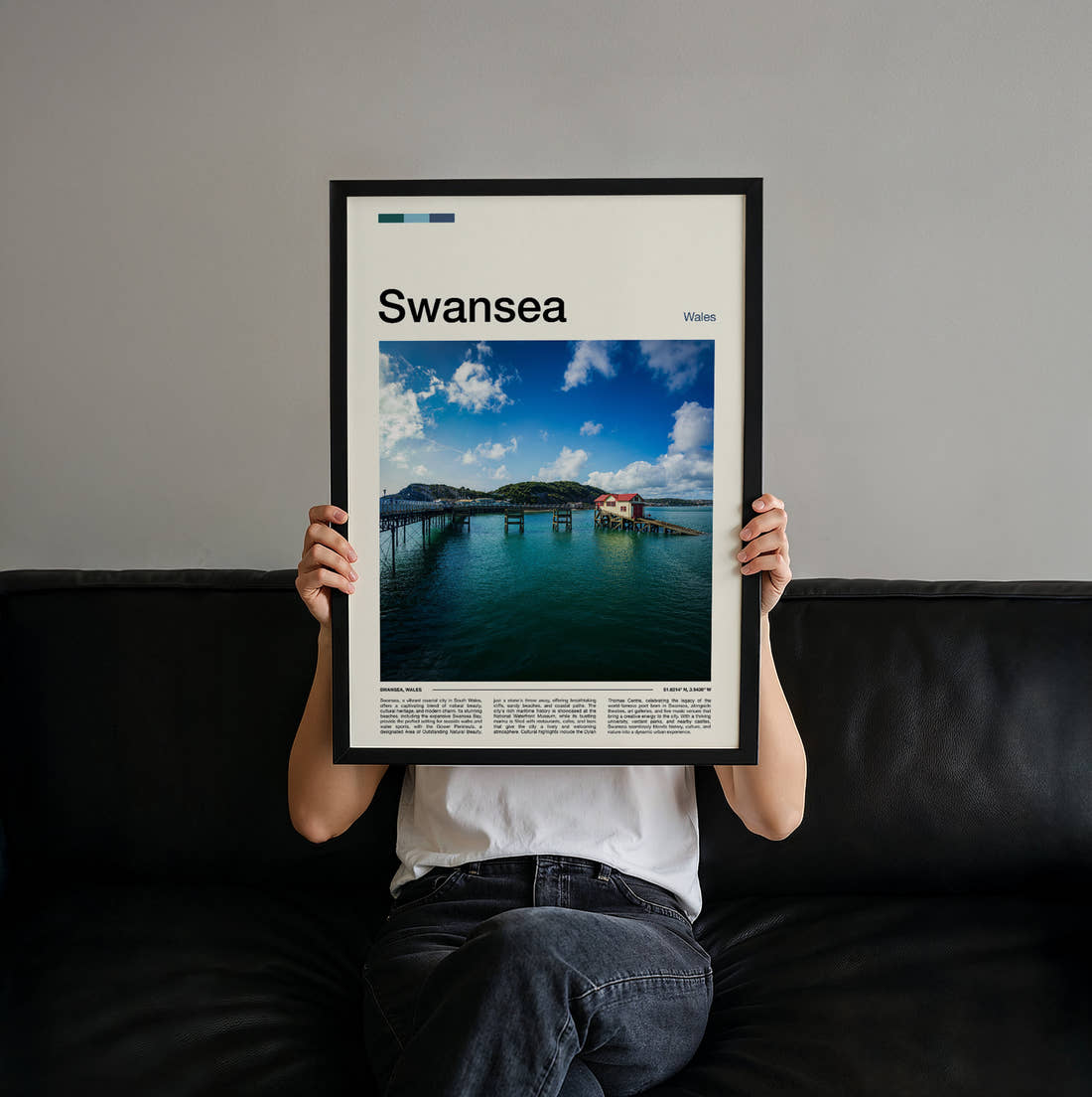 Swansea Mumbles Pier Travel Print held up by hand to show the size of the print