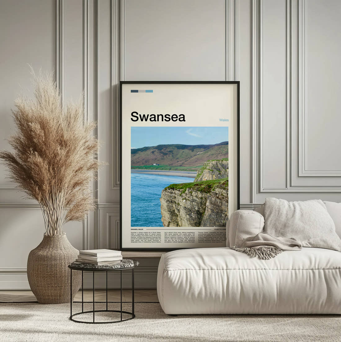 Swansea Worms Head Travel Print framed on the wall of a calm, neutral bedroom