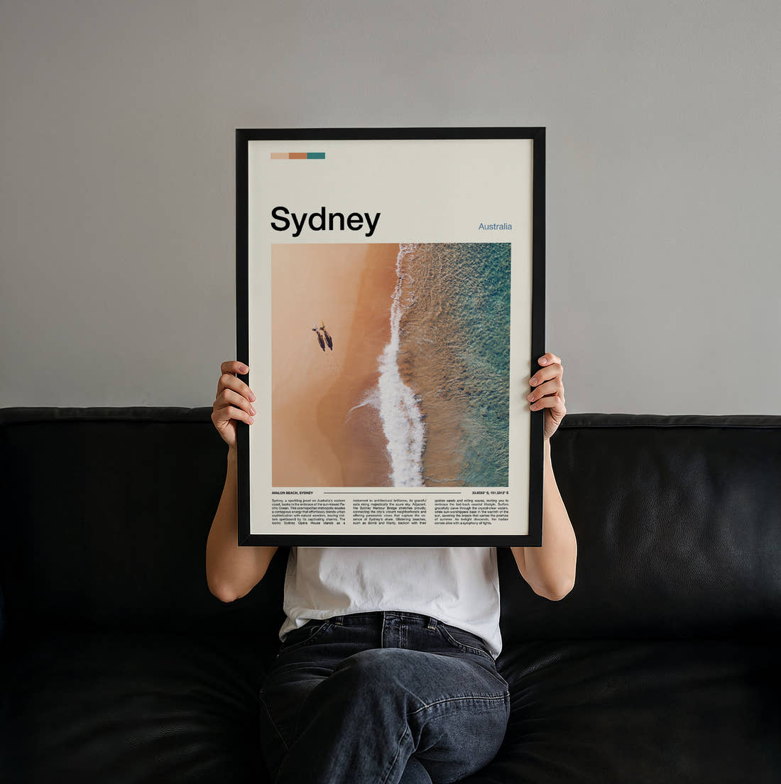 Sydney Aerial Beach View Travel Print held up by hand to show the size of the print
