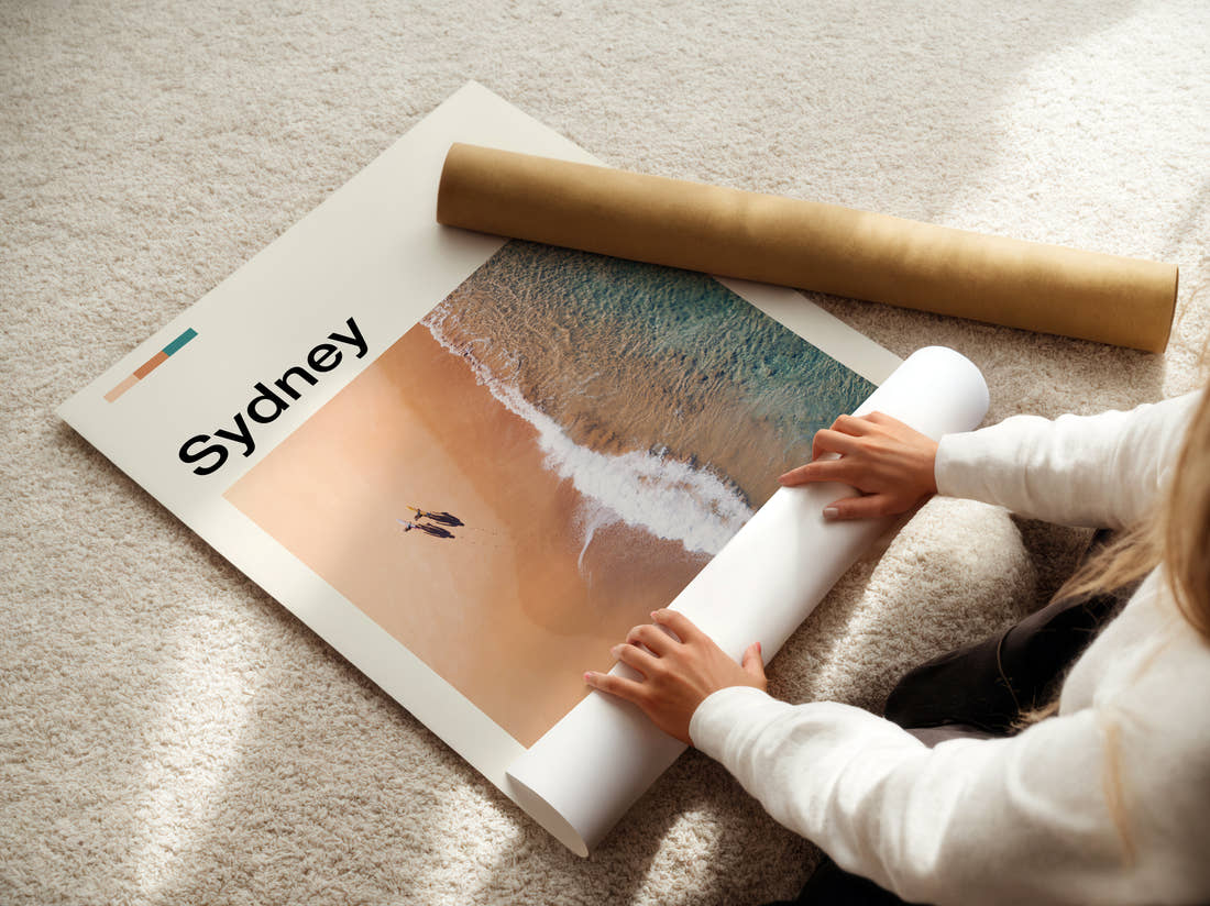 Sydney Aerial Beach View Travel Print being unrolled from its postal tube