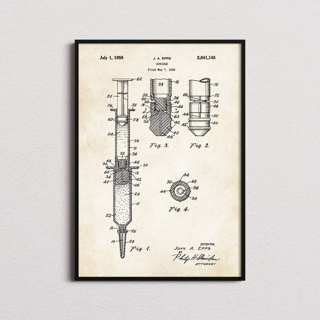 Syringe Patent Print in the aged paper colourway, framed