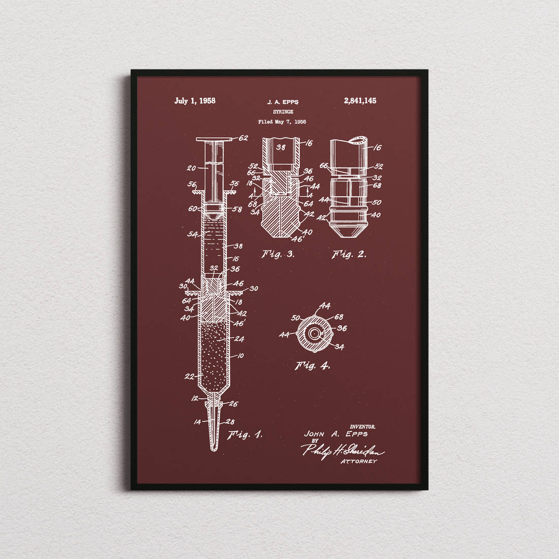 Syringe Patent Print in the burgundy colourway, framed