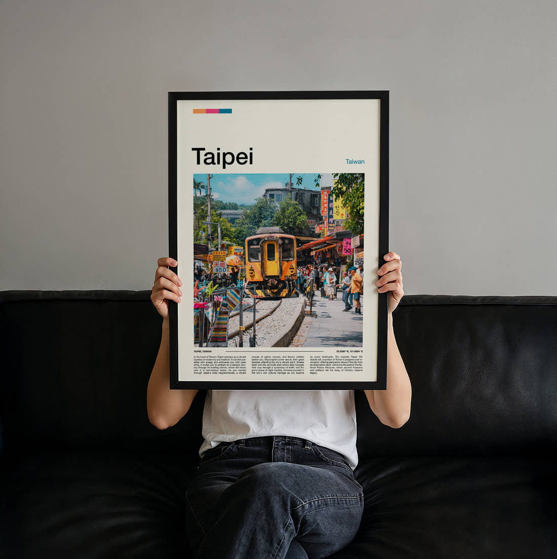 Taipei Train On Street Travel Print held up by hand to show the size of the print