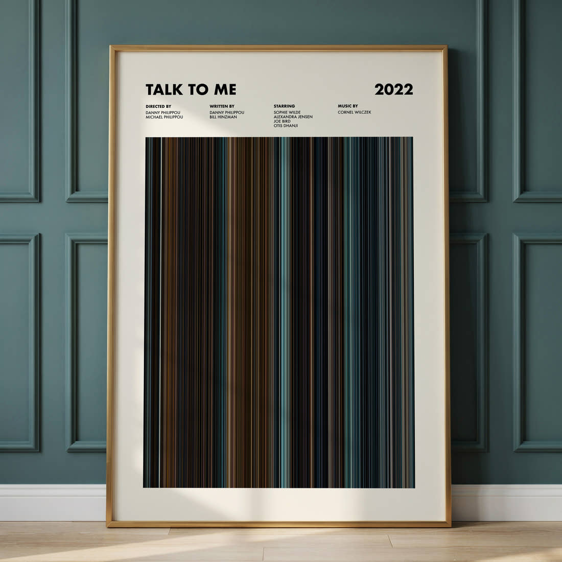 Talk To Me Movie Barcode Poster framed and leaning against a panelled wall