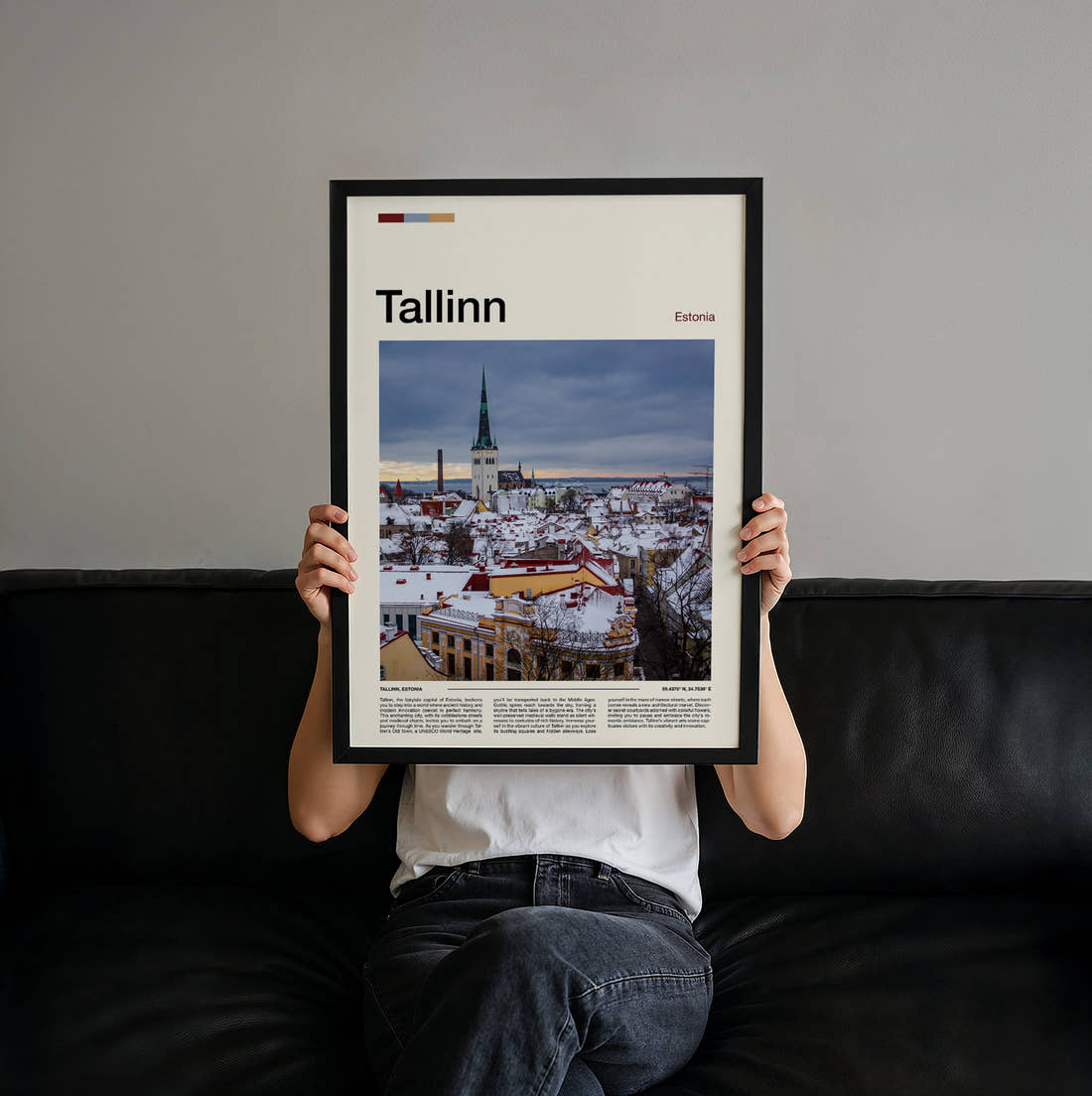 Tallinn Snowy Old Town Travel Print held up by hand to show the size of the print