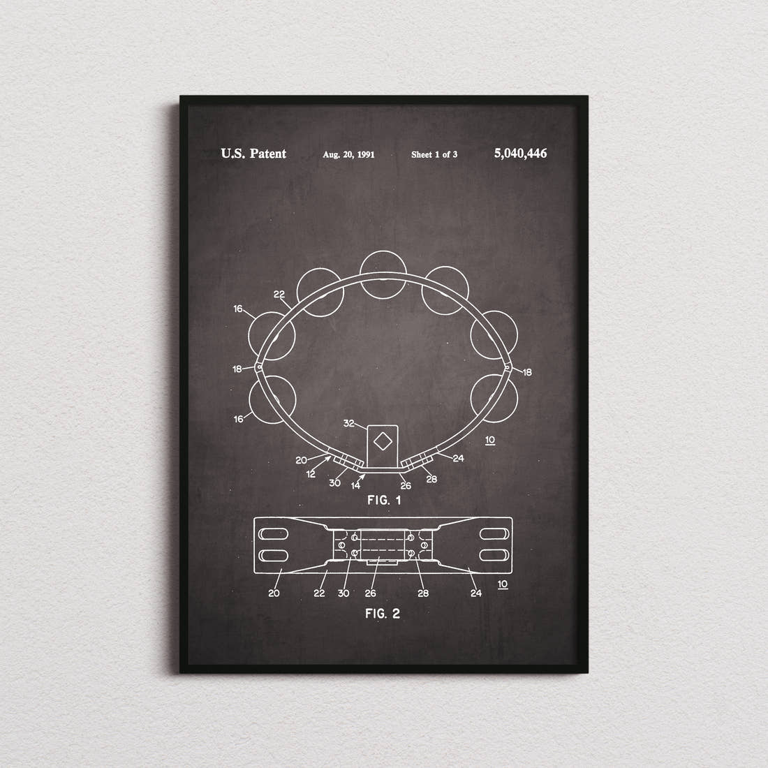 Tambourine Patent Print in the blackboard colourway, framed