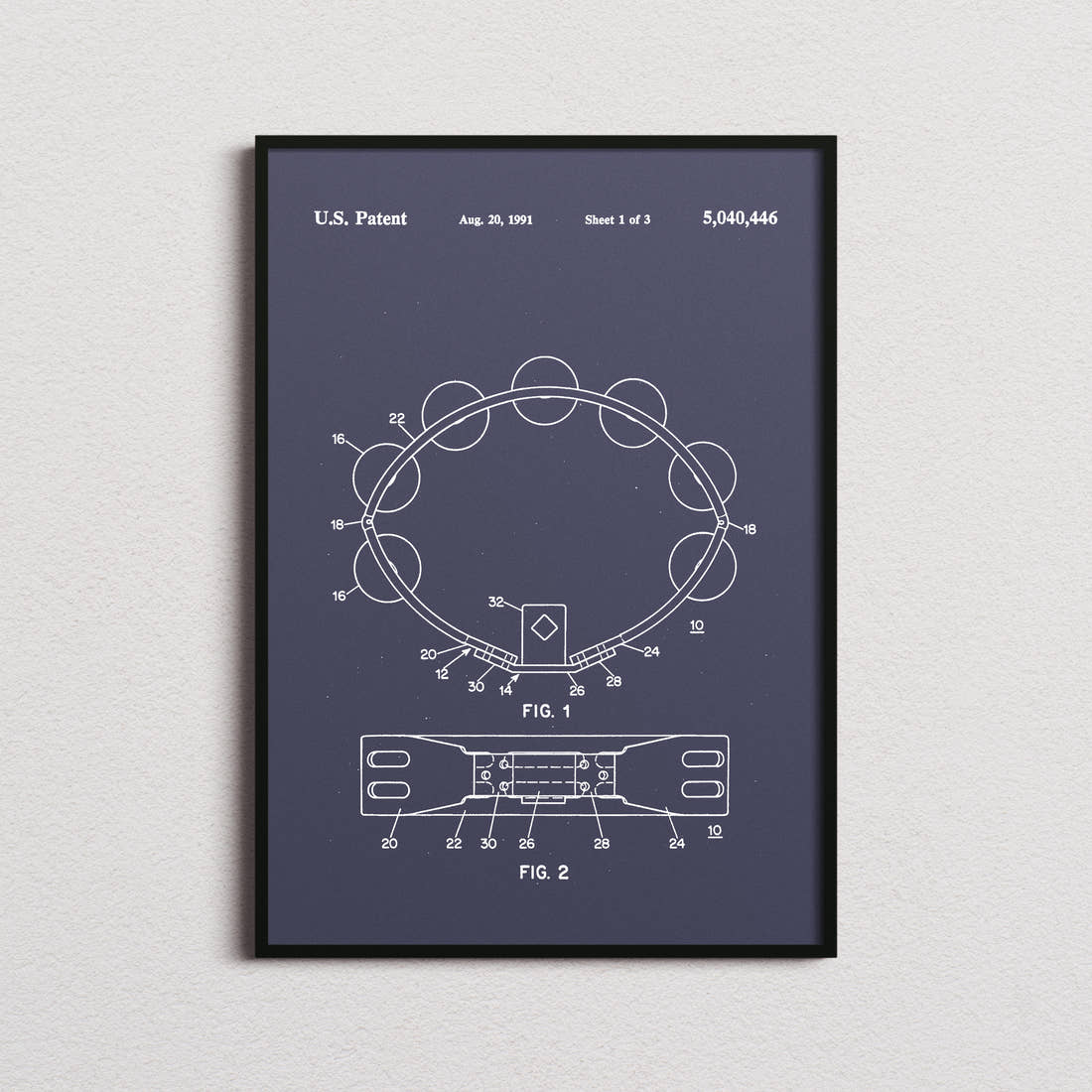 Tambourine Patent Print in the navy colourway, framed