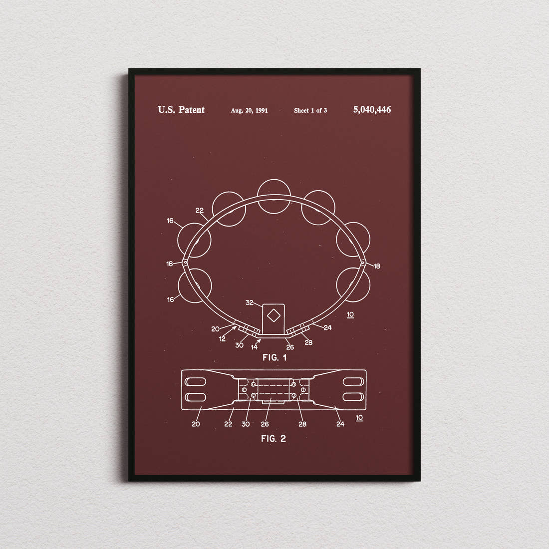 Tambourine Patent Print in the burgundy colourway, framed