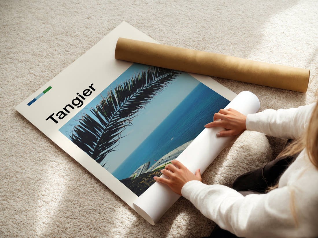 Tangier Palm Leaf Over Coast Travel Print being unrolled from its postal tube