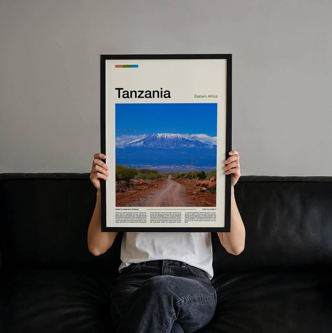 Tanzania Mount Kilimanjaro Beyond The Road Travel Print held up by hand to show the size of the print