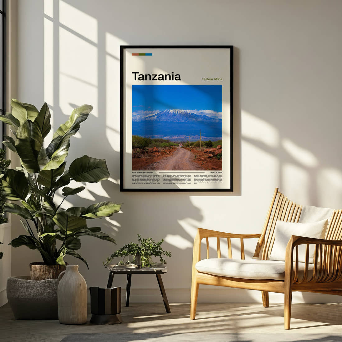 Tanzania Mount Kilimanjaro Beyond The Road Travel Print framed on a pale wall beside houseplants