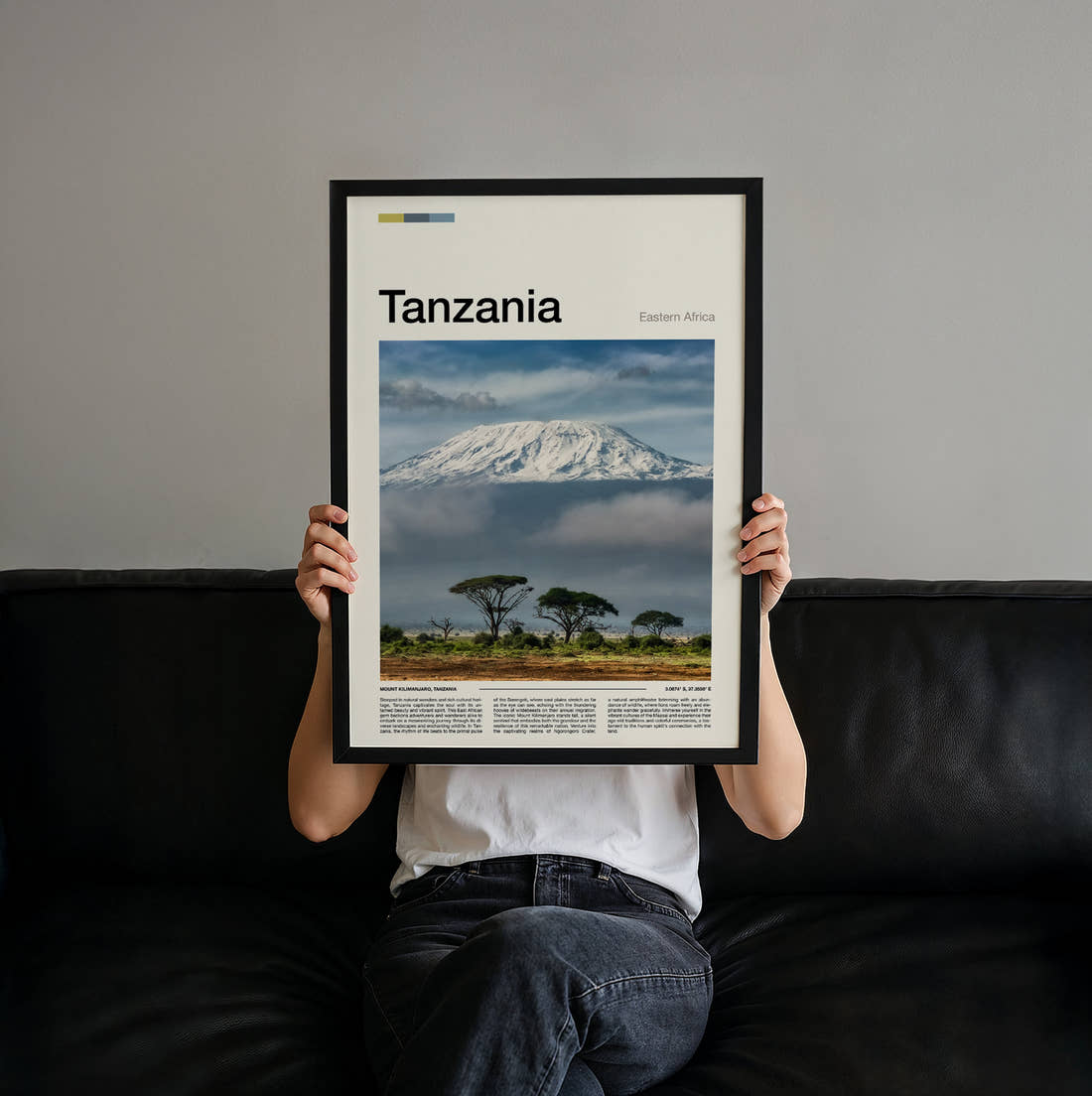 Tanzania Mount Kilimanjaro Above The Clouds Travel Print held up by hand to show the size of the print