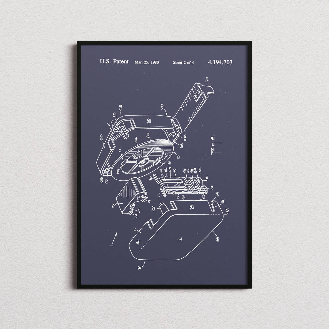 Tape Measure Patent Print in the navy colourway, framed