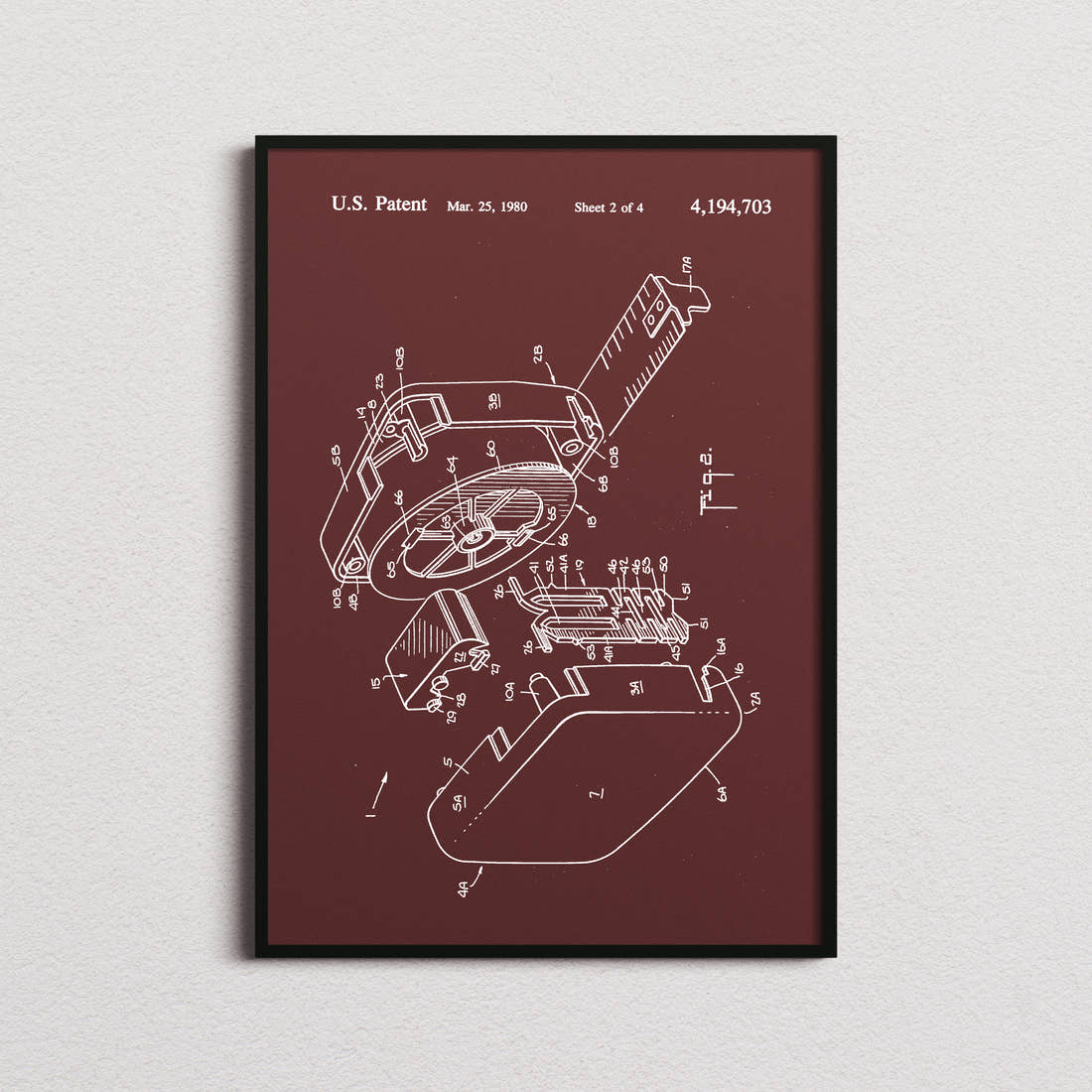 Tape Measure Patent Print in the burgundy colourway, framed