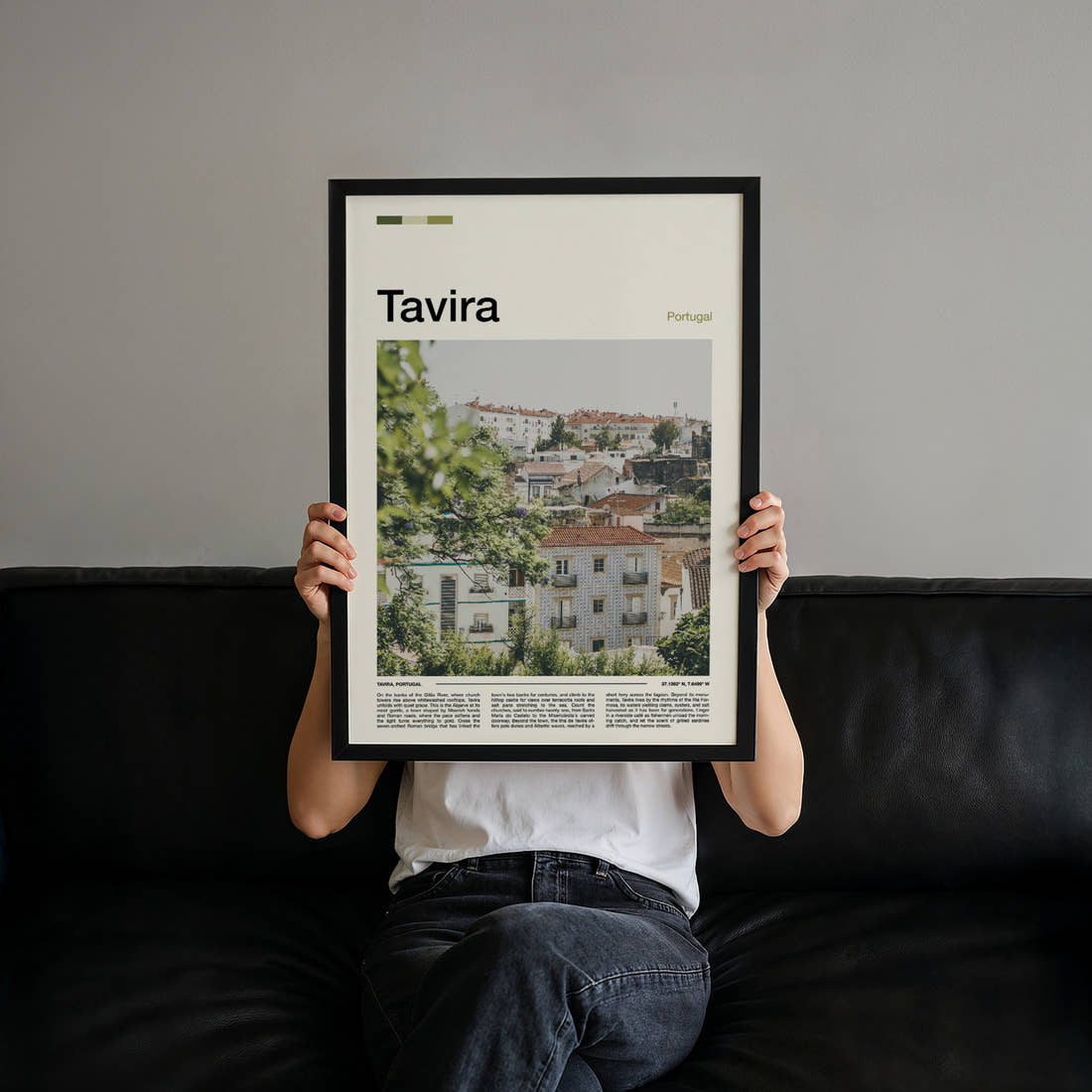 Tavira Whitewashed Hillside Town Travel Print held up by hand to show the size of the print