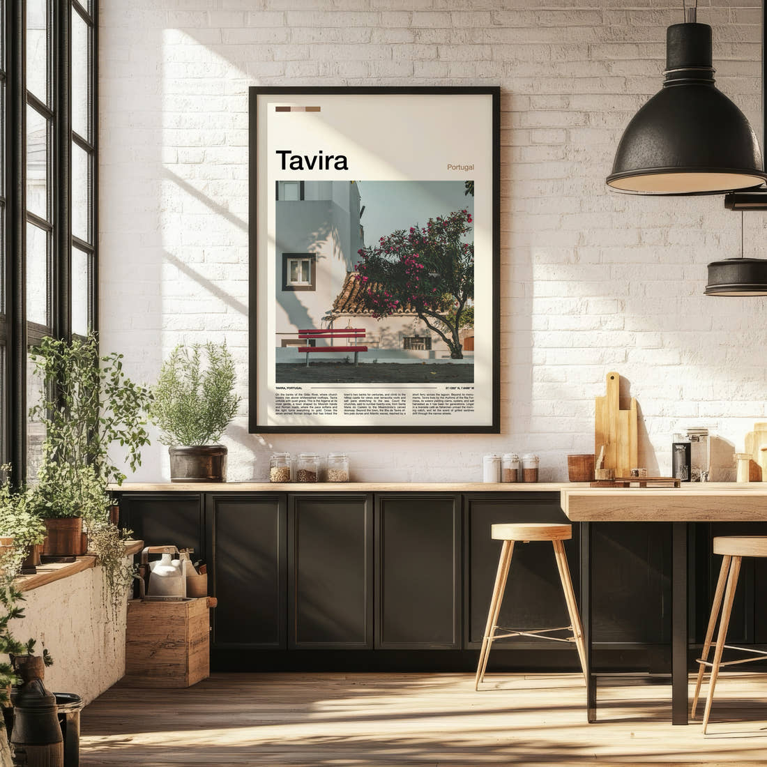 Tavira Whitewashed Courtyard Corner Travel Print framed on the wall of a bright kitchen and dining space
