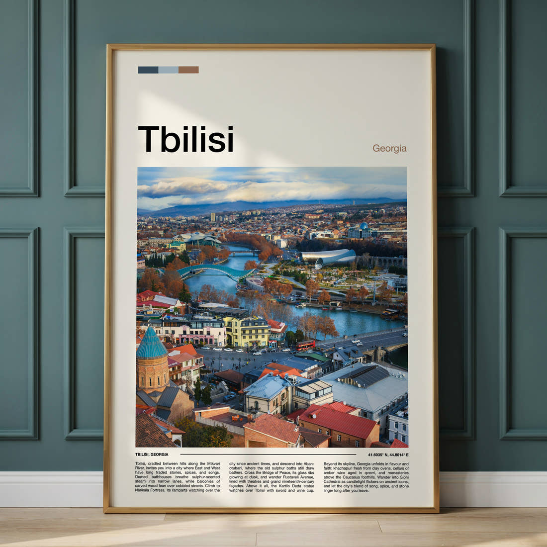 Tbilisi Riverside City View Travel Print framed on the wall of a calm, neutral bedroom