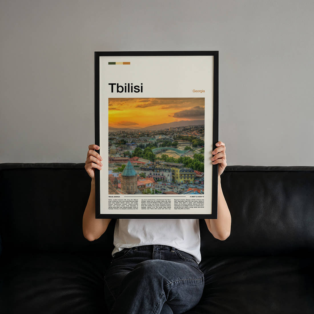 Tbilisi Sunset City Skyline Travel Print held up by hand to show the size of the print