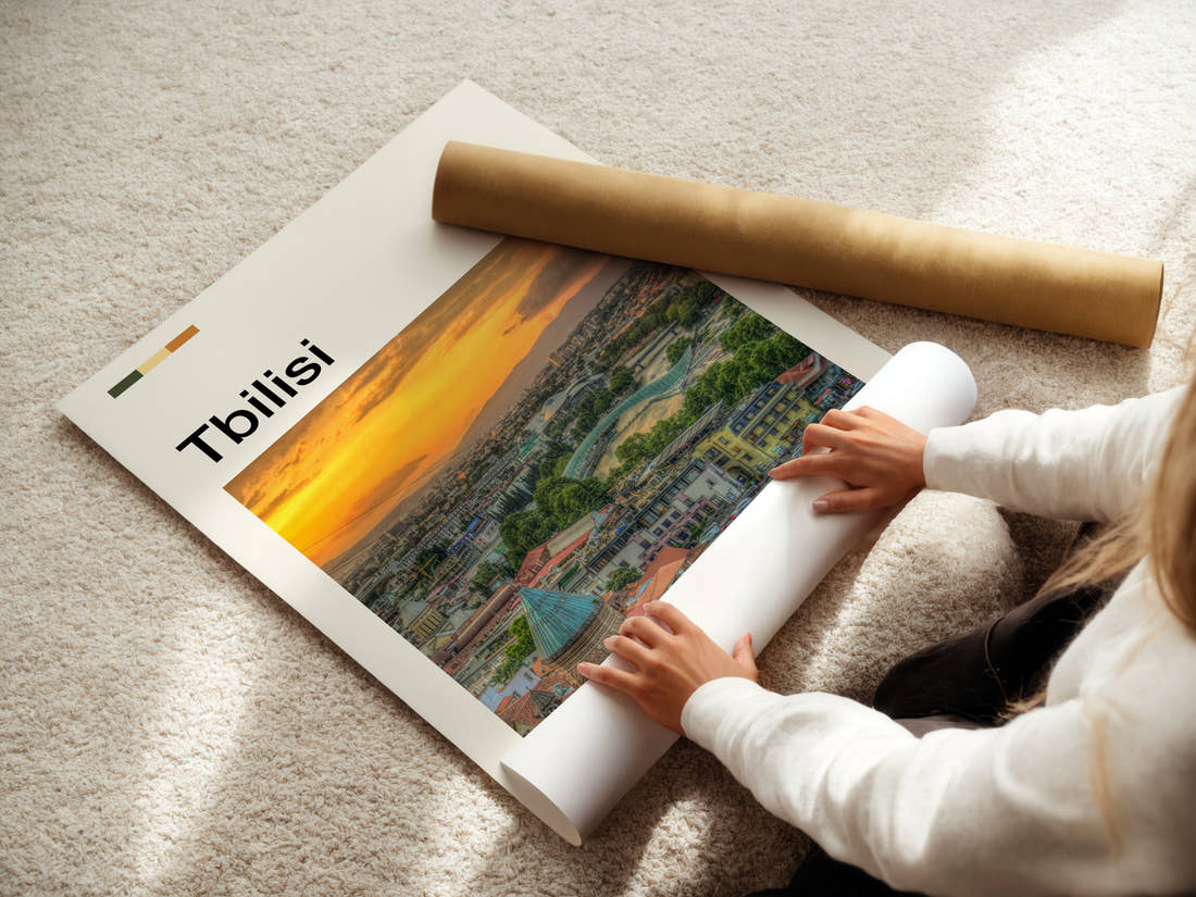 Tbilisi Sunset City Skyline Travel Print being unrolled from its postal tube