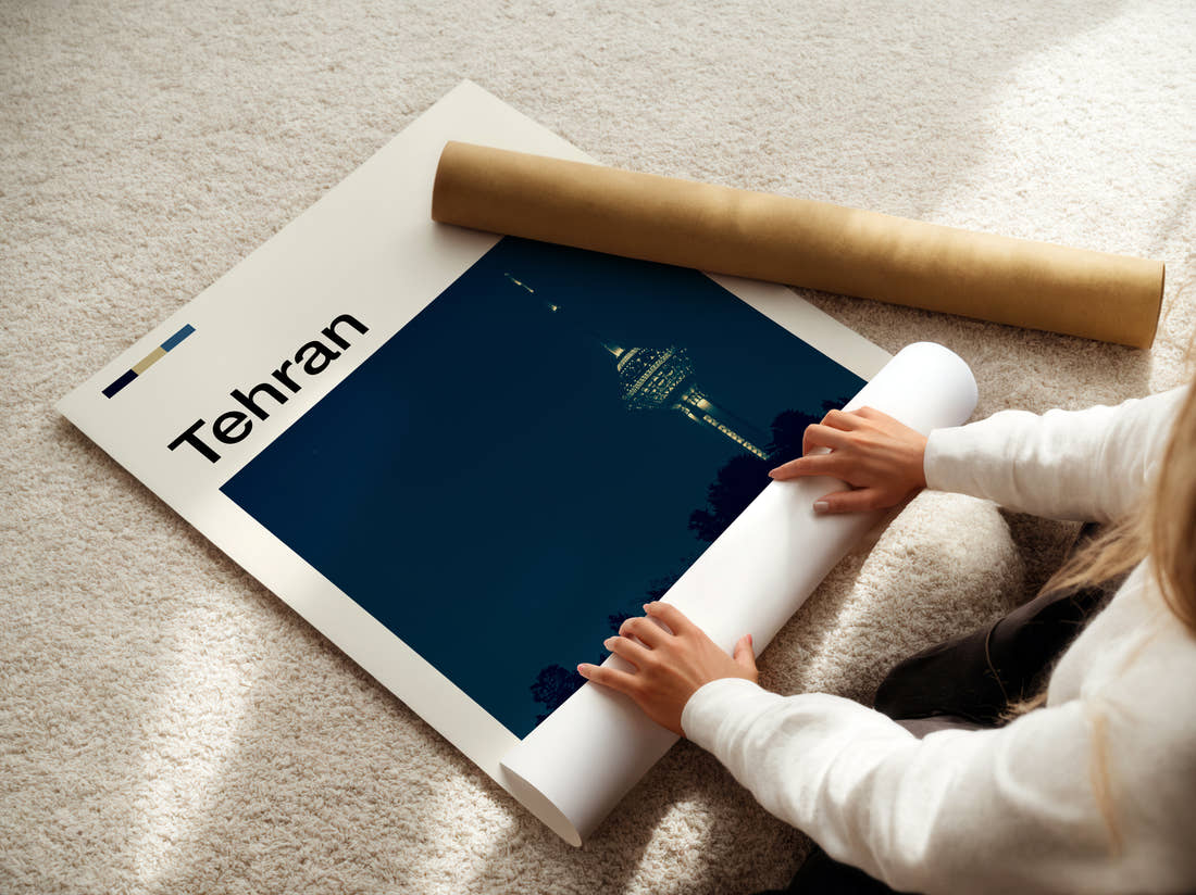 Tehran Milad Tower At Night Travel Print being unrolled from its postal tube