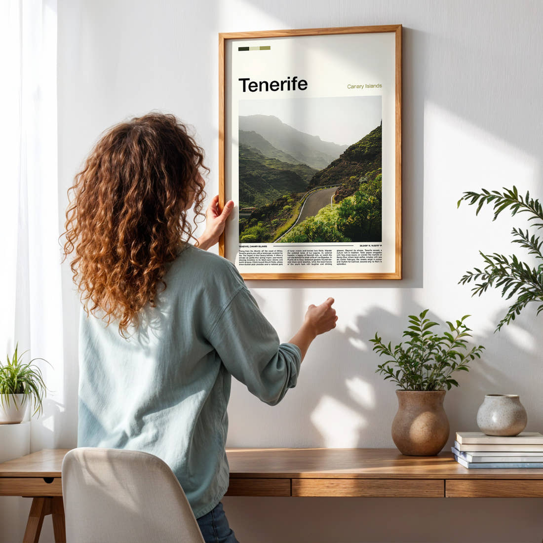 Tenerife Winding Mountain Road Travel Print framed on a pale wall beside houseplants
