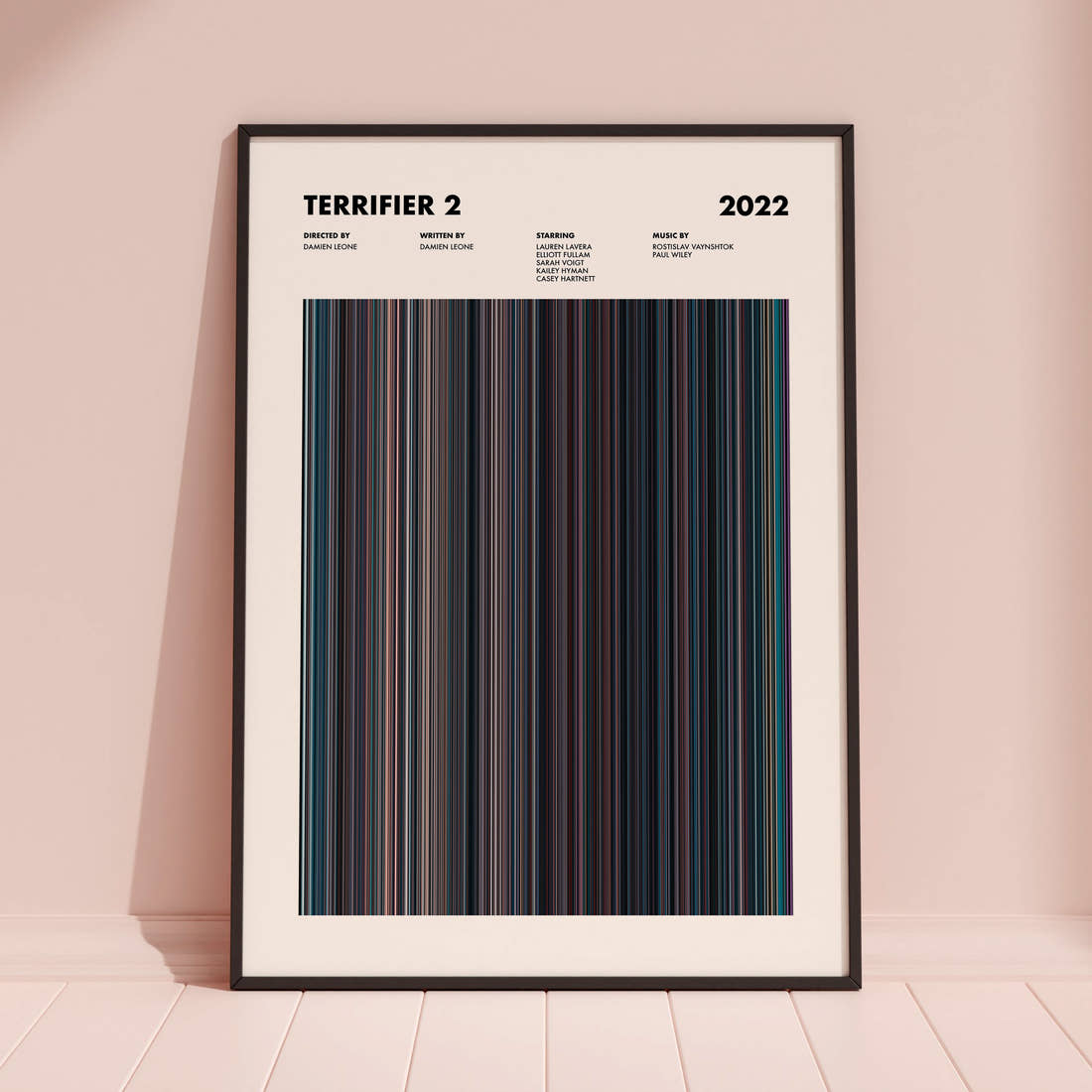 Terrifier 2 Movie Barcode Poster framed and leaning against a coloured wall