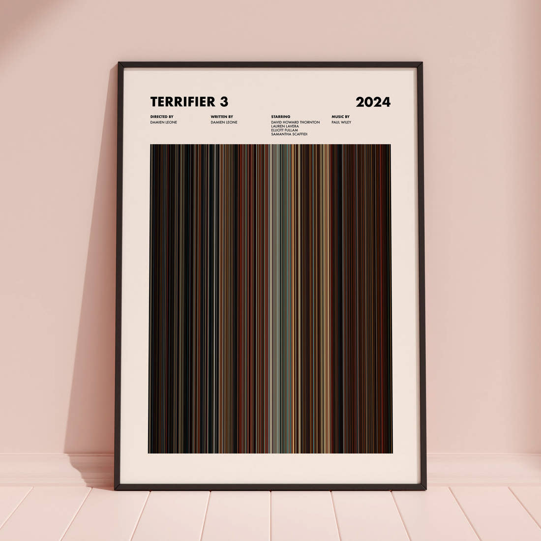 Terrifier 3 Movie Barcode Poster framed and leaning against a coloured wall