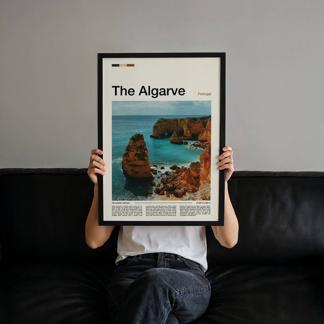 The Algarve Limestone Sea Cliffs Travel Print held up by hand to show the size of the print