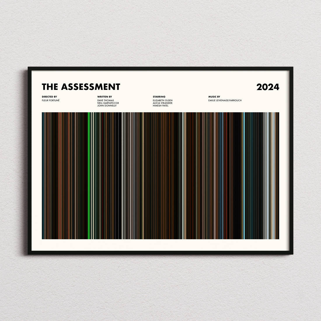The Assessment Movie Barcode Poster framed and photographed straight on