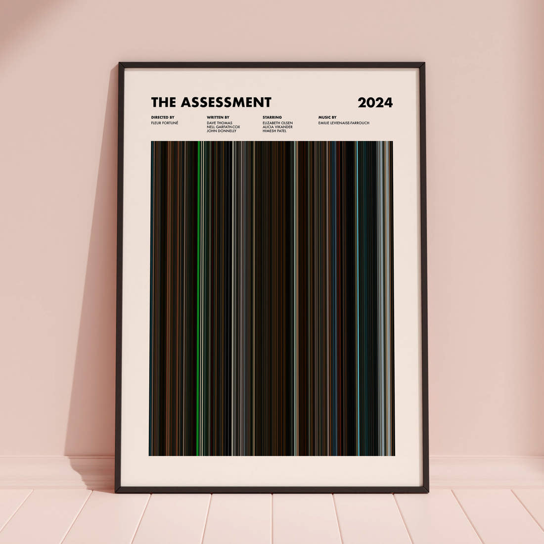 The Assessment Movie Barcode Poster framed and leaning against a coloured wall