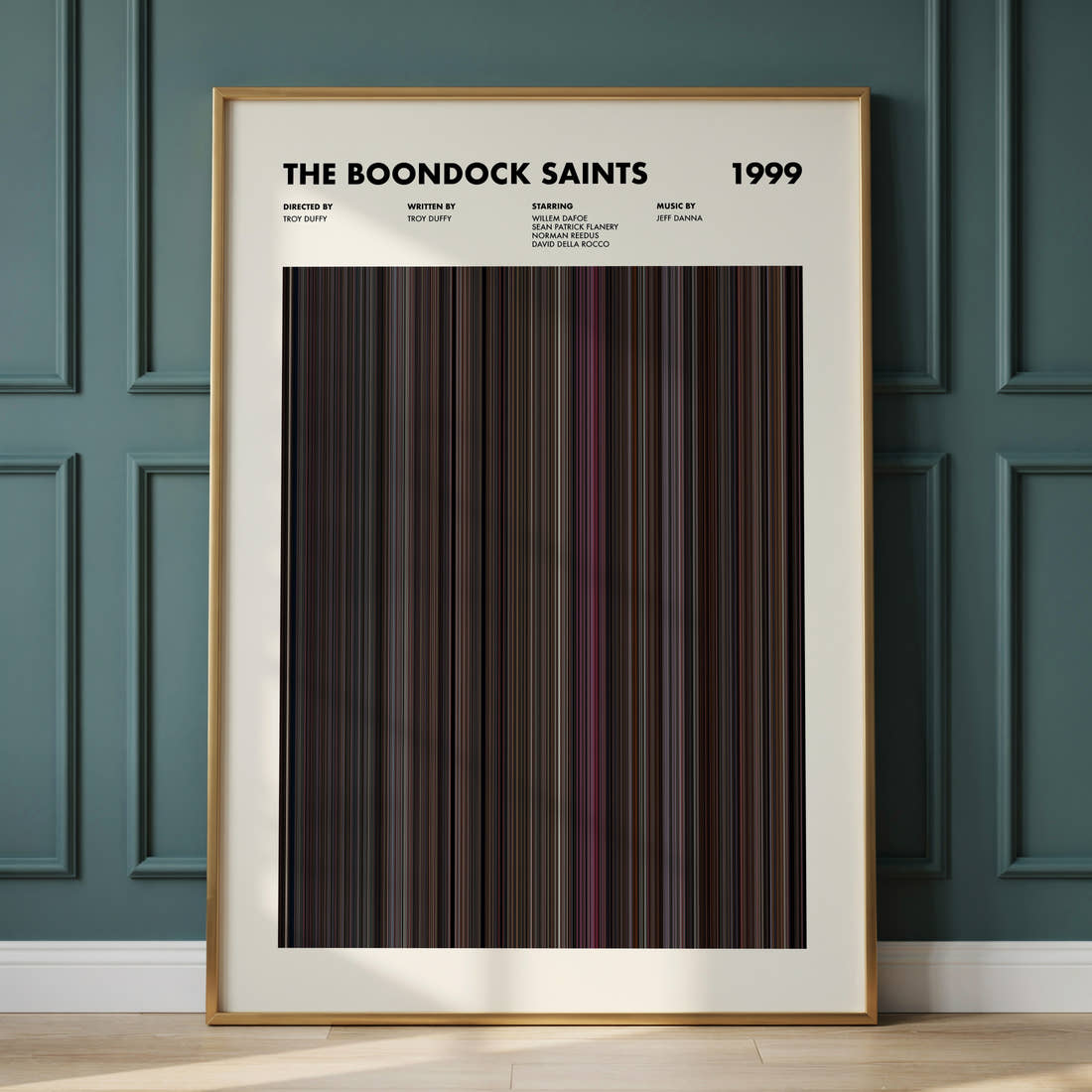 The Boondock Saints Movie Barcode Poster framed and leaning against a panelled wall
