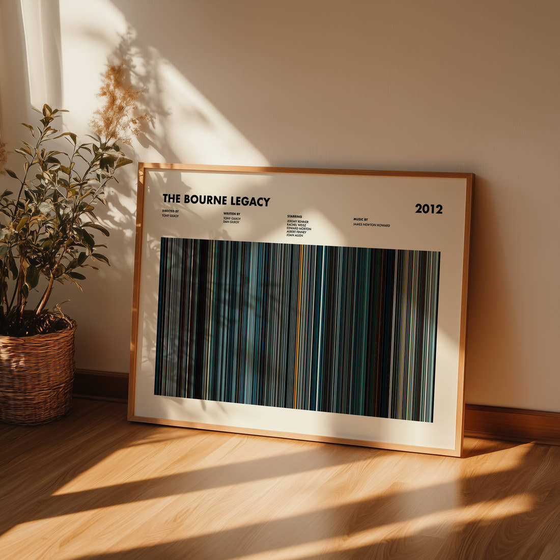 The Bourne Legacy Movie Barcode Poster framed and leaning against a wall on a wooden floor