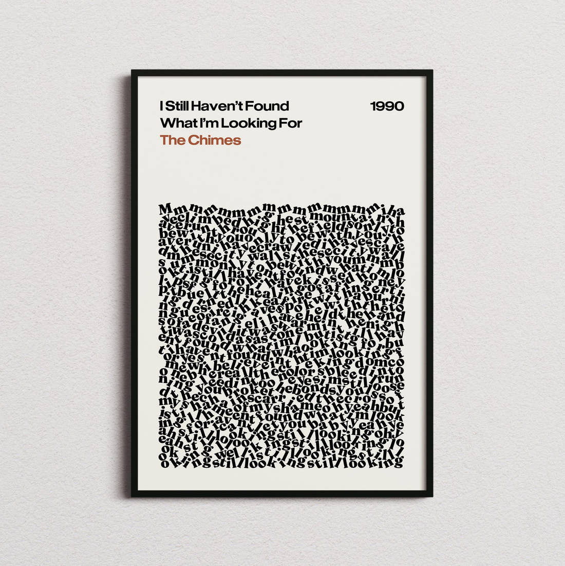 The Chimes I Still Haven't Found What I'm Looking For Lyric Print in the cream colourway, framed