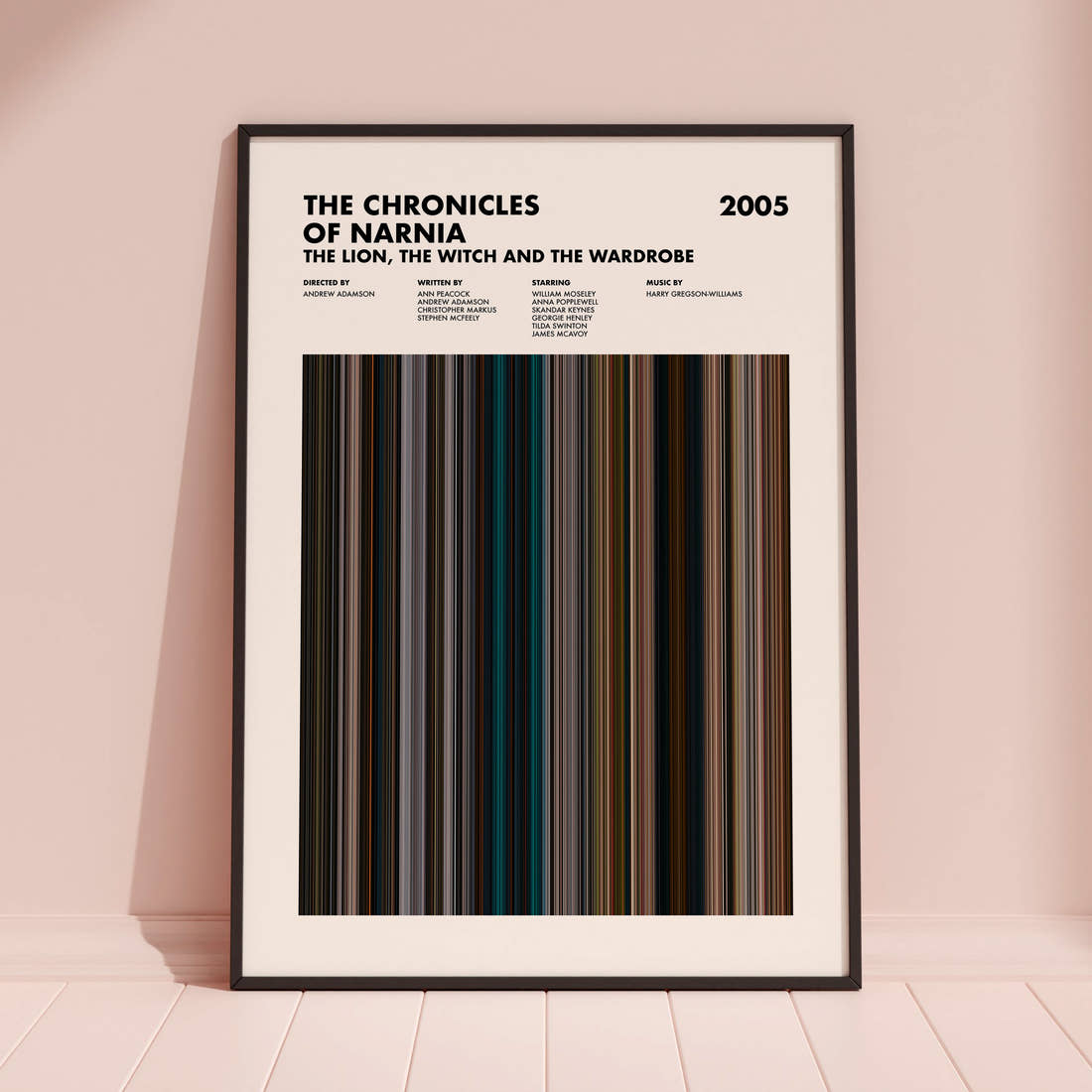 The Chronicles of Narnia: The Lion, the Witch and the Wardrobe Movie Barcode Poster framed and leaning against a coloured wall
