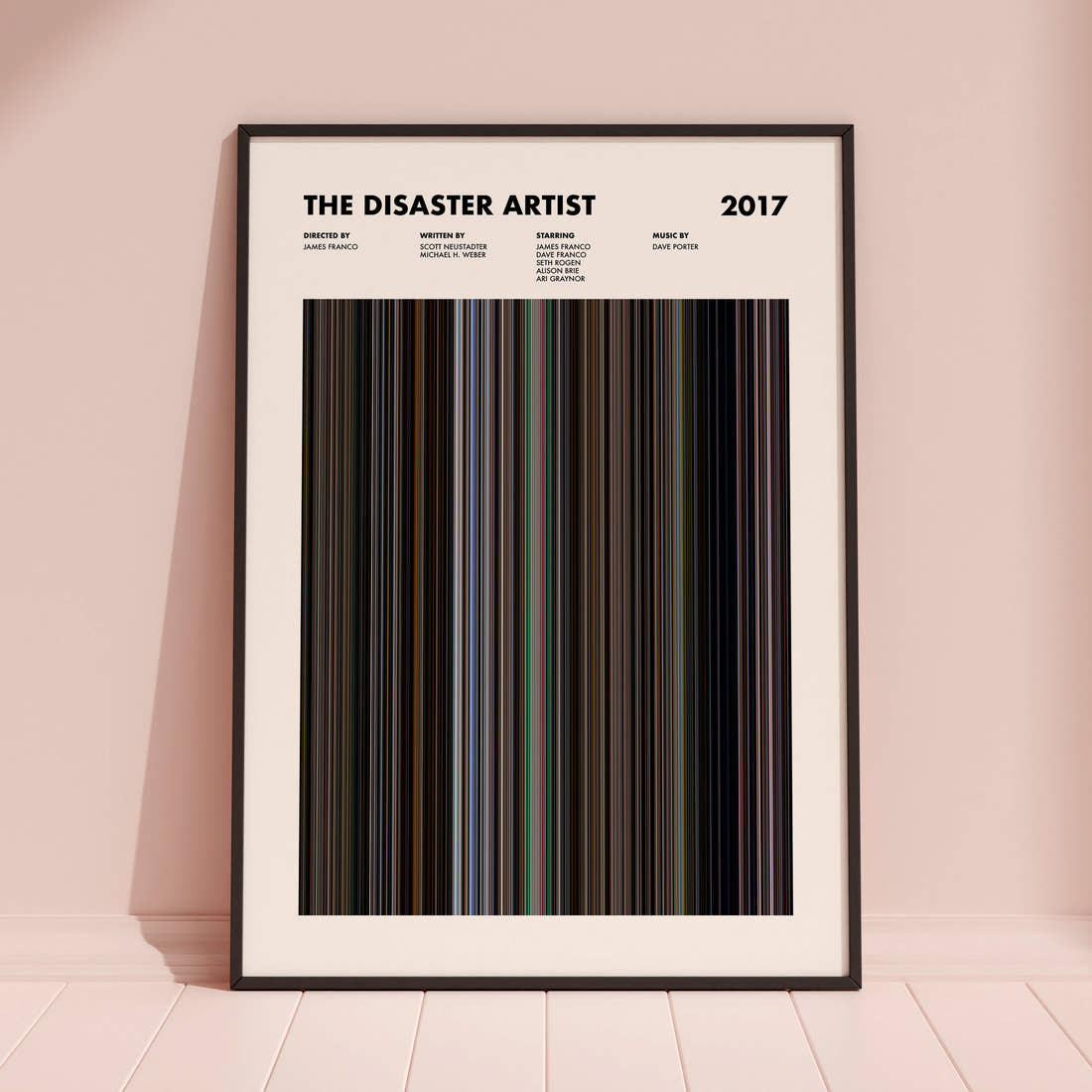 The Disaster Artist Movie Barcode Poster framed and leaning against a coloured wall