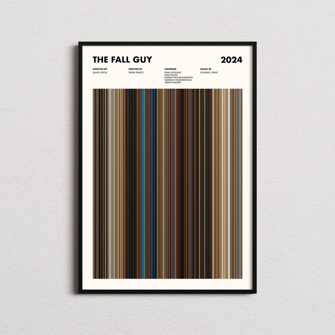 The Fall Guy Movie Barcode Poster framed on a plain studio wall