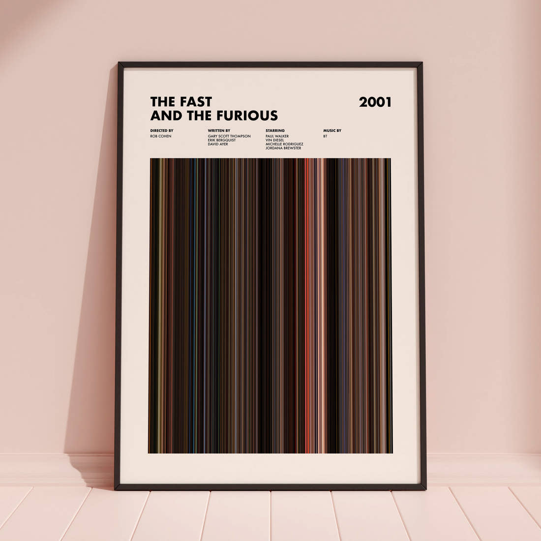 The Fast And The Furious Movie Barcode Poster framed and leaning against a coloured wall